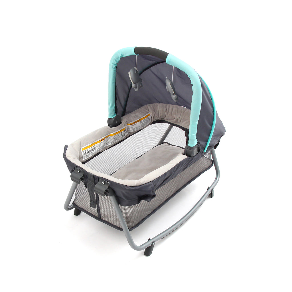 Rock-A-Bye Bassinet with Canopy & Toys