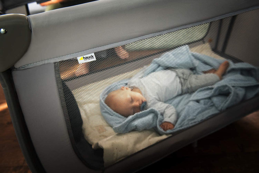 Baby sleeping in outlet playpen