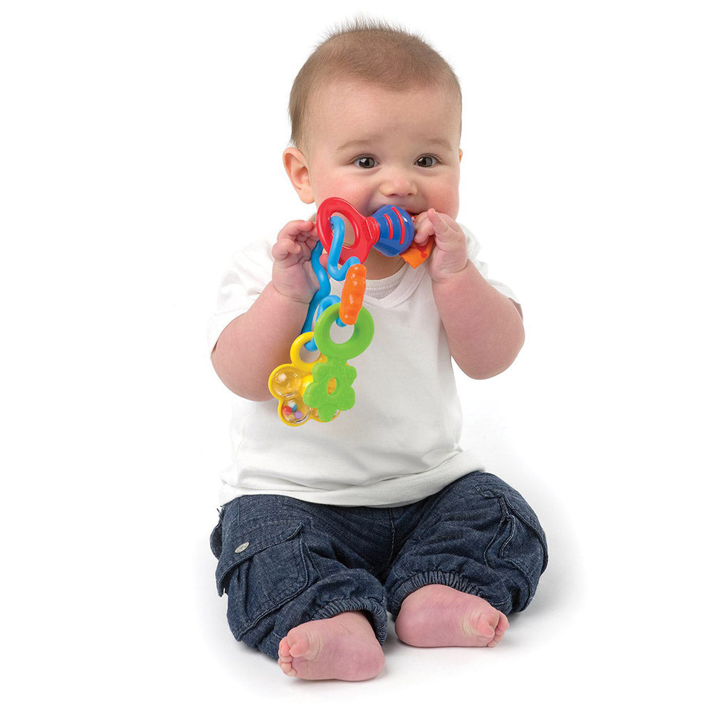 baby with rattle